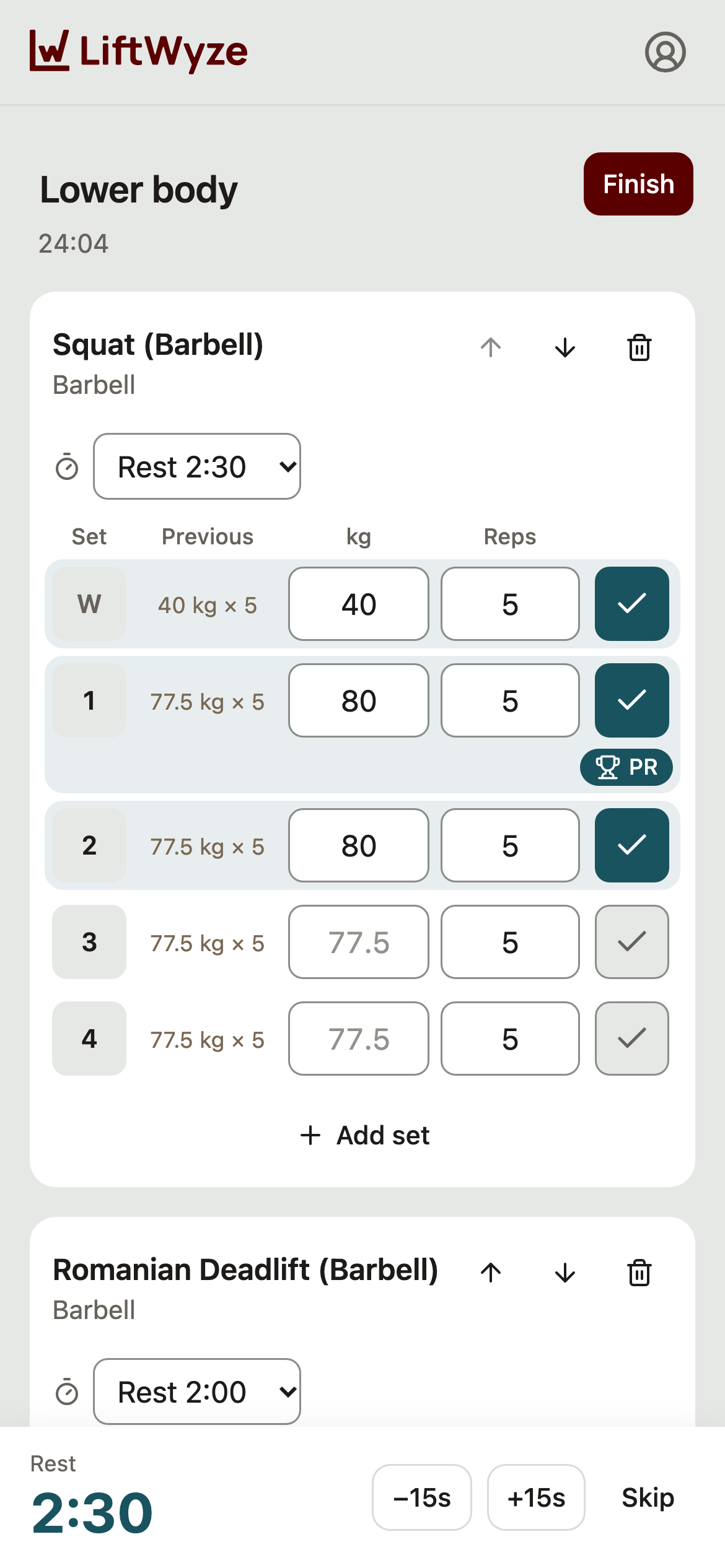The LiftWyze logger mid-workout: squat sets ticked, a PR on the first working set and the rest timer running.